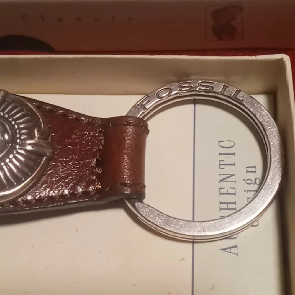 Fossil genuine leather snap key chain.